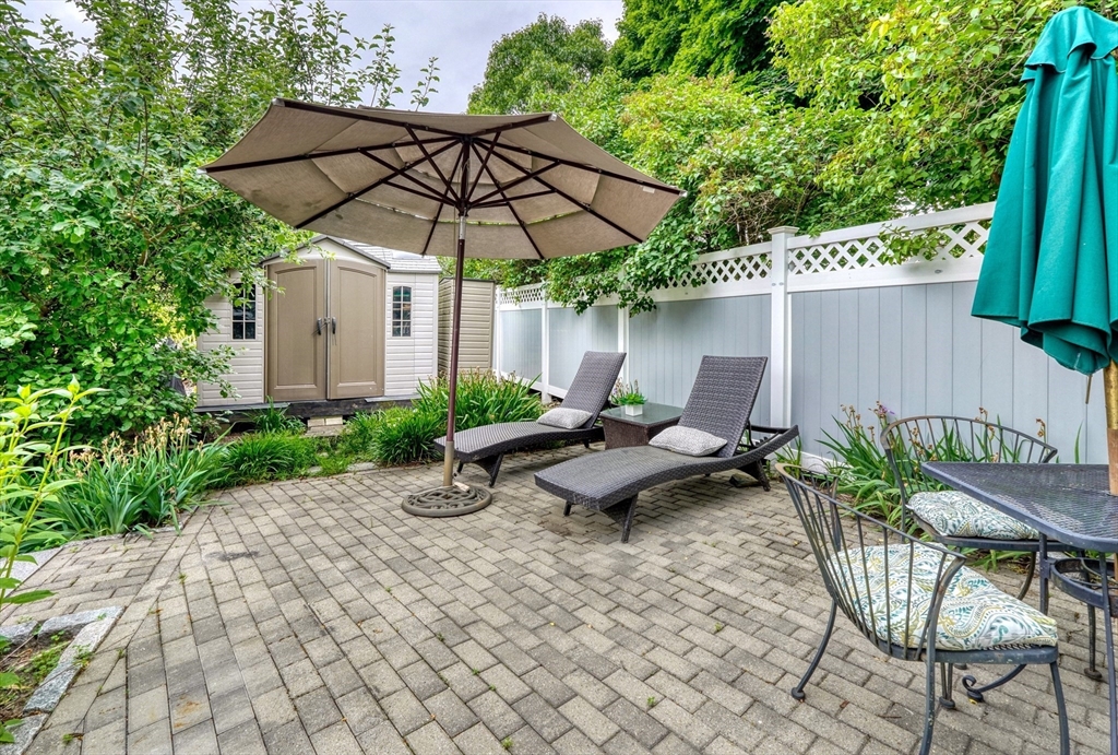 14 Paul Road Medford, MA 02155 - Photo 29 of 42 a view of backyard with seating space and trees