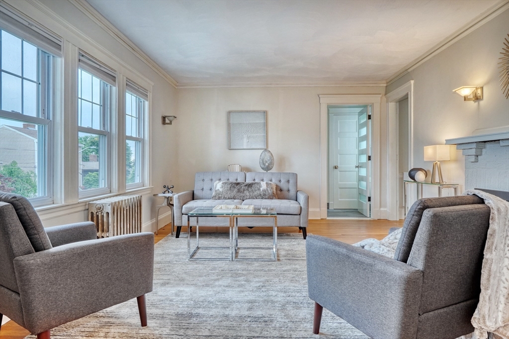 14 Paul Road Medford, MA 02155 - Photo 3 of 42 a living room with furniture and a large window