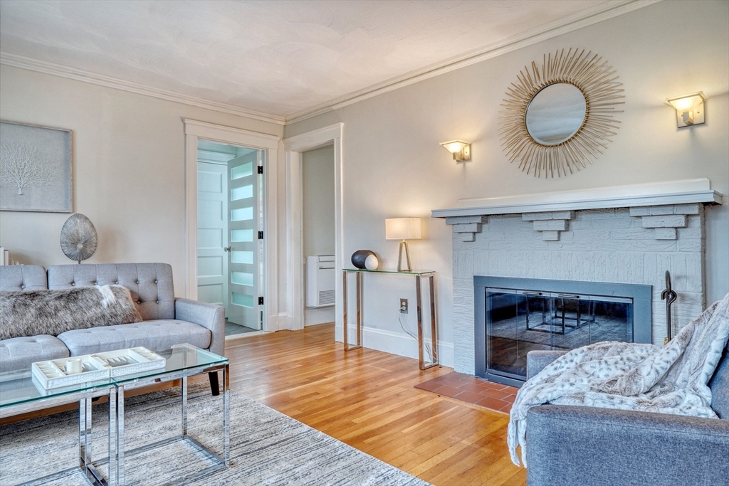 14 Paul Road Medford, MA 02155 - Photo 4 of 42 a living room with furniture and a fireplace