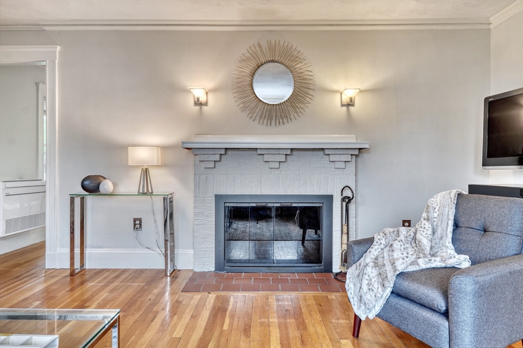14 Paul Road Medford, MA 02155 - Photo 5 of 42 a living room with furniture and a fireplace