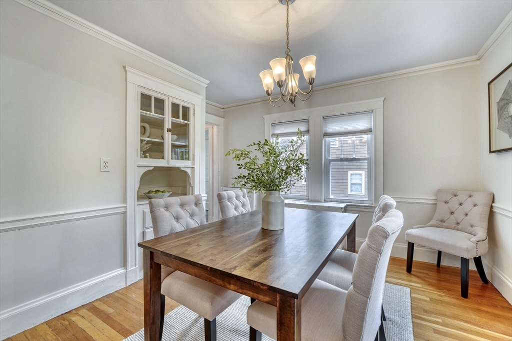 14 Paul Road Medford, MA 02155 - Photo 7 of 42 a view of a dining room with furniture and wooden floor