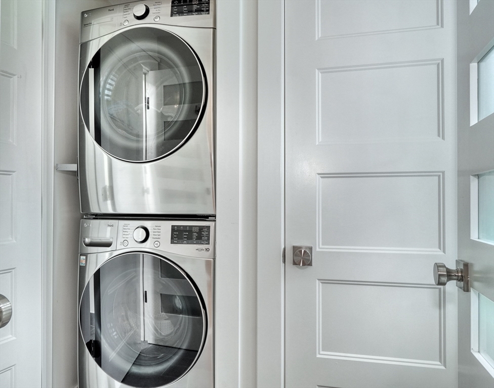 14 Paul Road Medford, MA 02155 - Photo 10 of 42 a utility room with dryer and washer