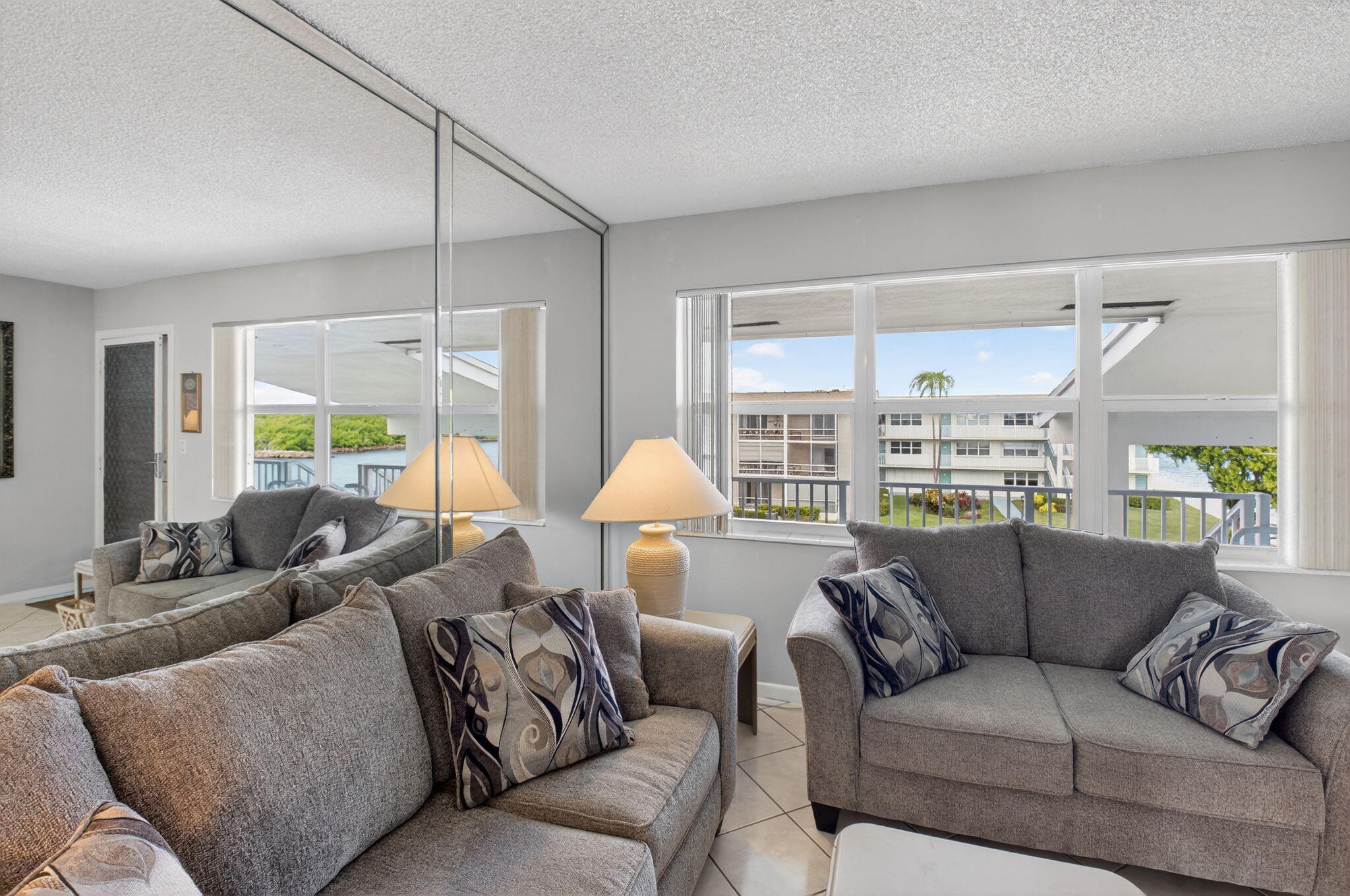 770 Horizon Street East, Unit 311 Boynton Beach, FL 33435 - Photo 27 of 52 a living room with furniture and a large window