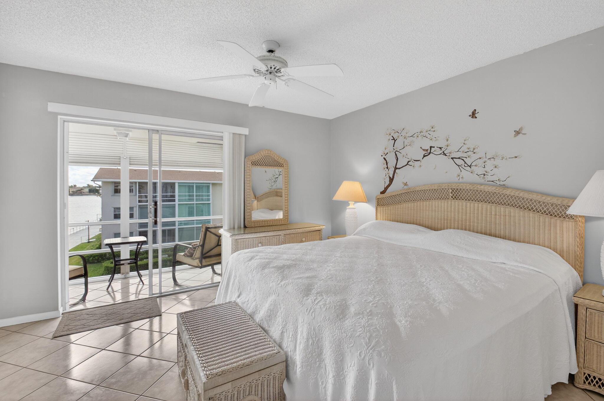 770 Horizon Street East, Unit 311 Boynton Beach, FL 33435 - Photo 29 of 52 a bedroom with a large bed and a window