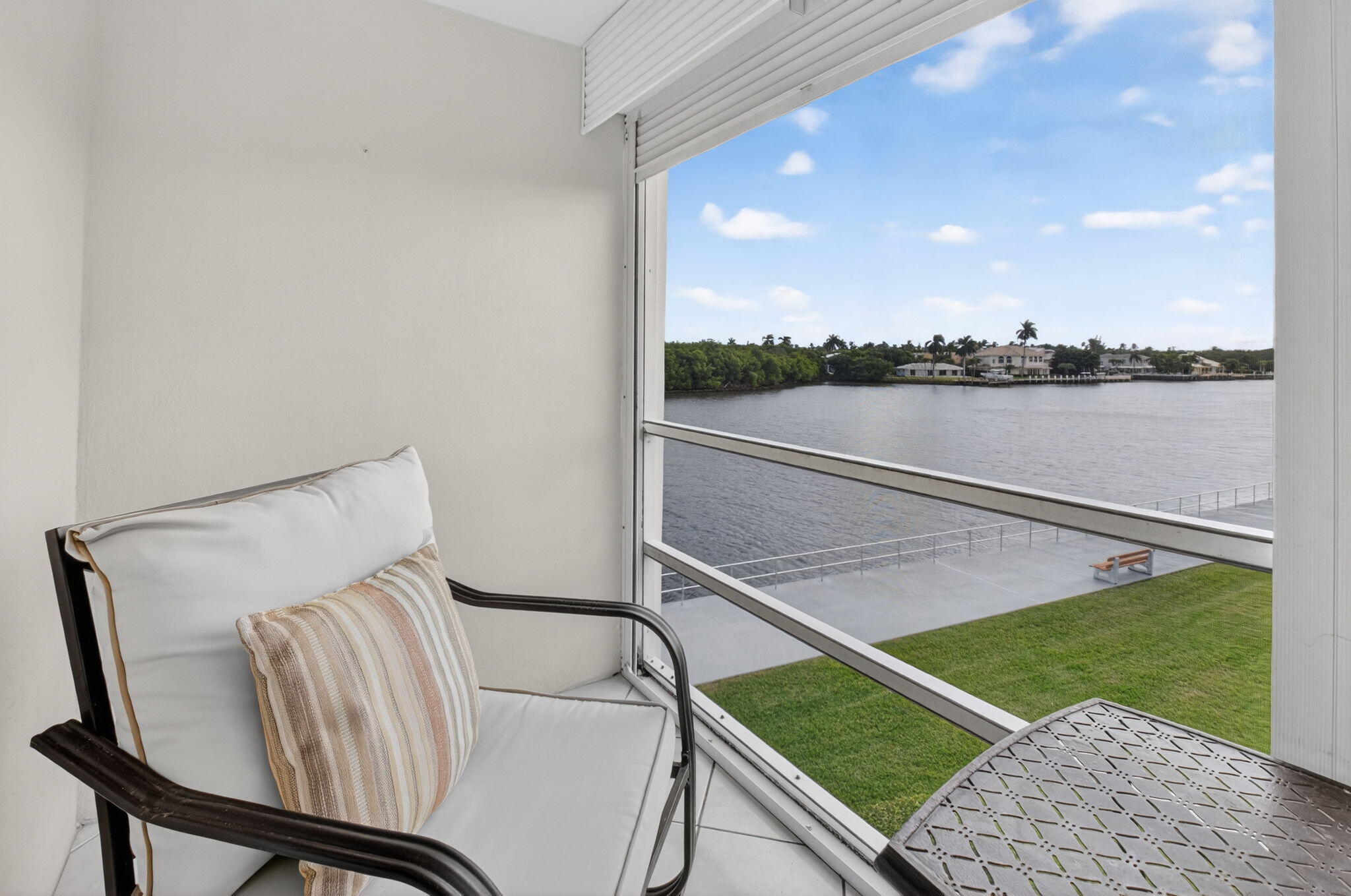 770 Horizon Street East, Unit 311 Boynton Beach, FL 33435 - Photo 33 of 52 a view of a lake from a balcony