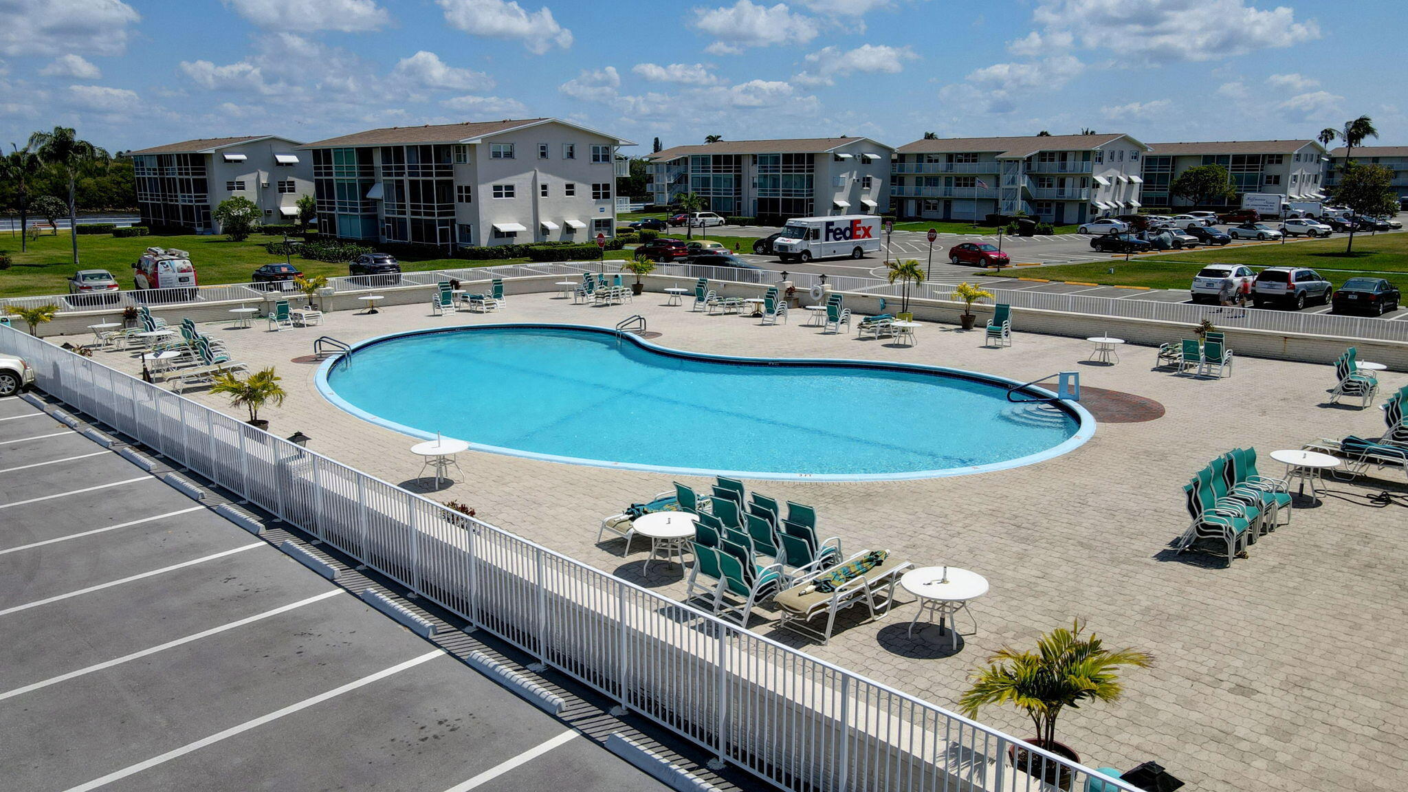 770 Horizon Street East, Unit 311 Boynton Beach, FL 33435 - Photo 48 of 52 a view of a swimming pool with furniture