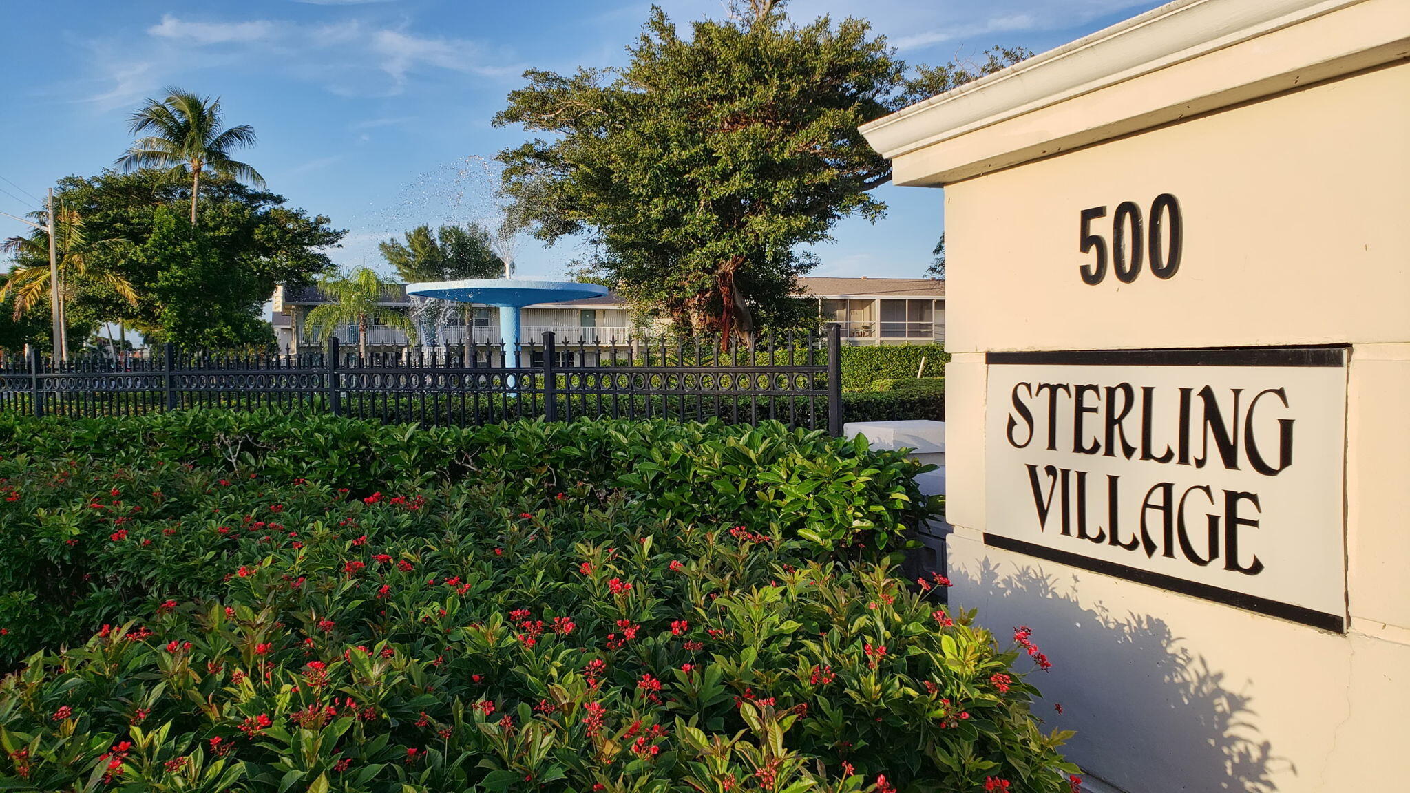 770 Horizon Street East, Unit 311 Boynton Beach, FL 33435 - Photo 52 of 52 a view of sign board with flower plants