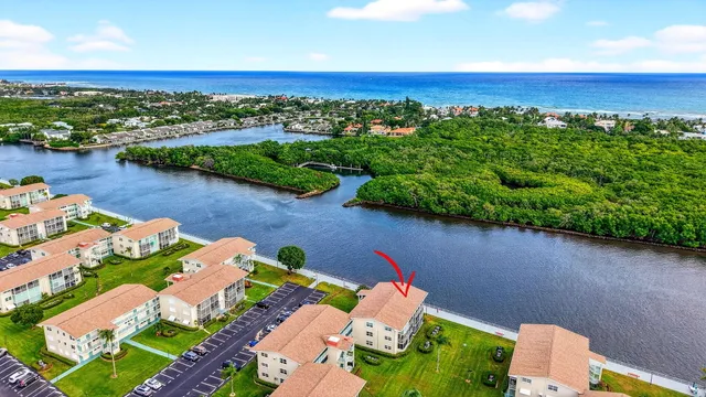 a view of a lake with a yard