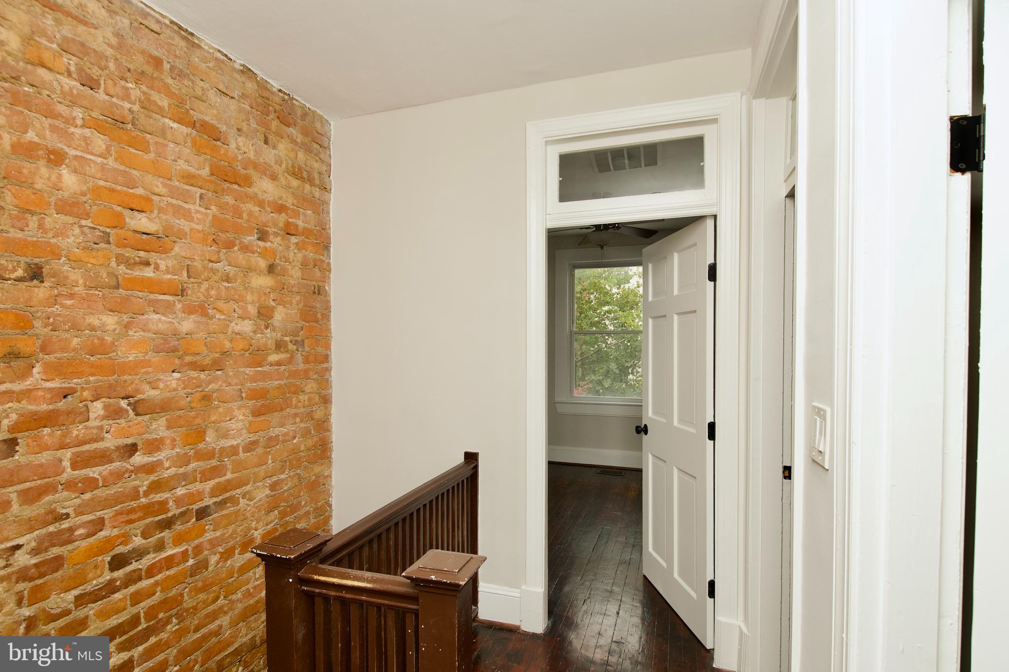 116 Todd Place Northeast Washington, DC 20002 - Photo 15 of 34 a view of hallway with wooden floor