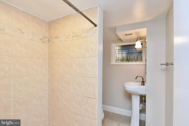 a view of balcony with wooden floor