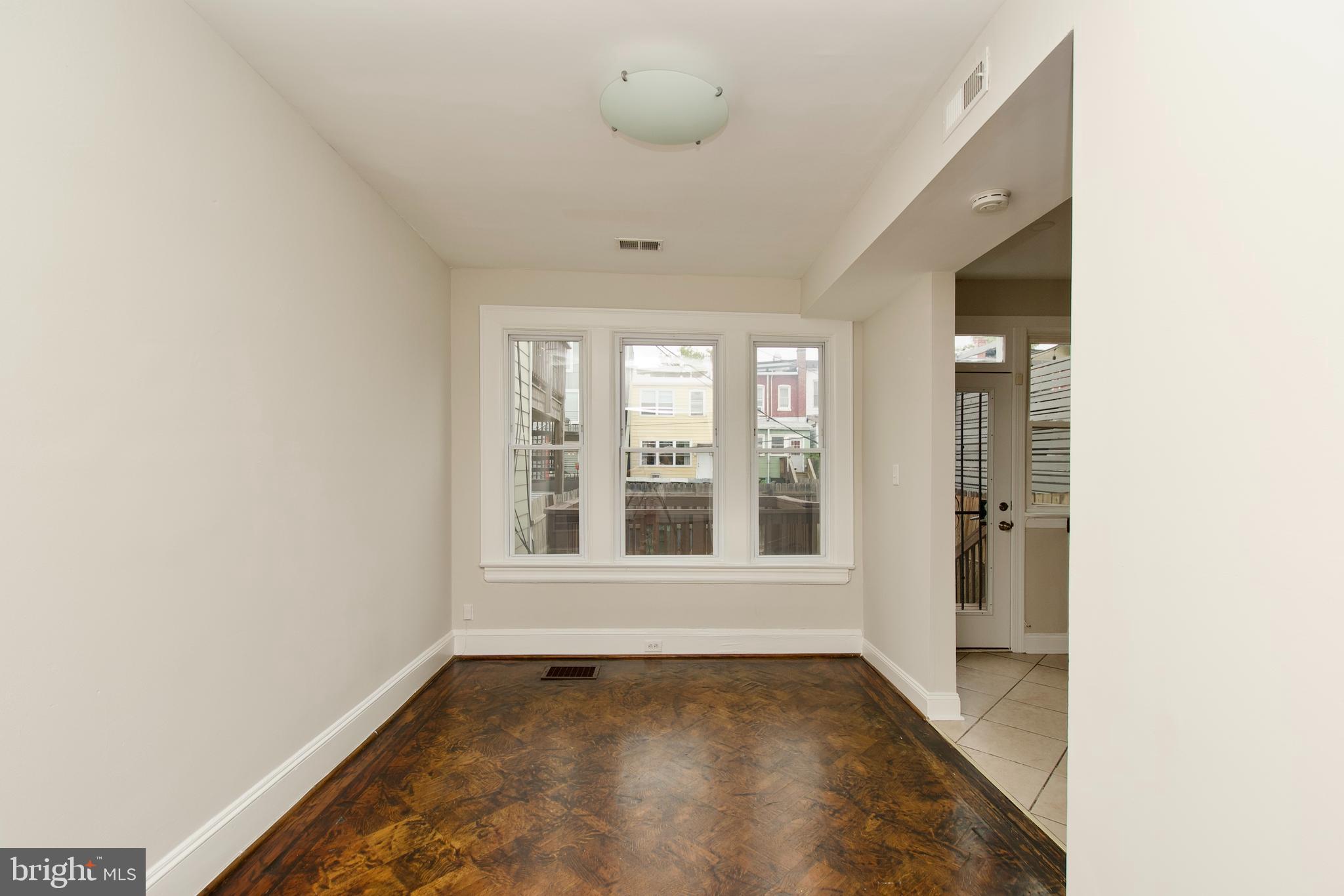 116 Todd Place Northeast Washington, DC 20002 - Photo 7 of 34 a view of an empty room with a window