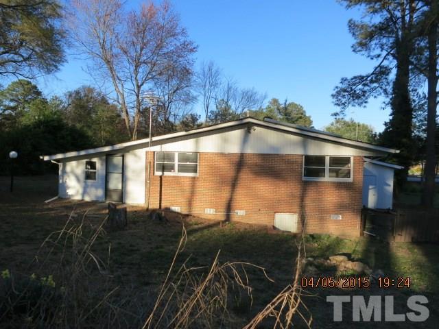 4107 North New Hope Road Raleigh, NC 27604 - Photo 5 of 10 a side view of a house with a yard