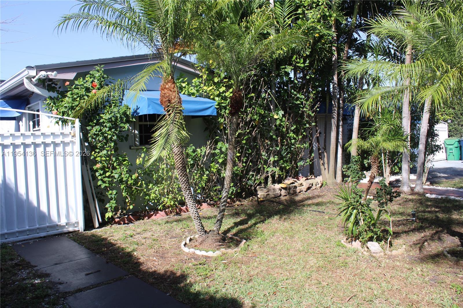 6030 Southwest 93rd Court Miami, FL 33173 - Photo 2 of 9 a view of a backyard with plants