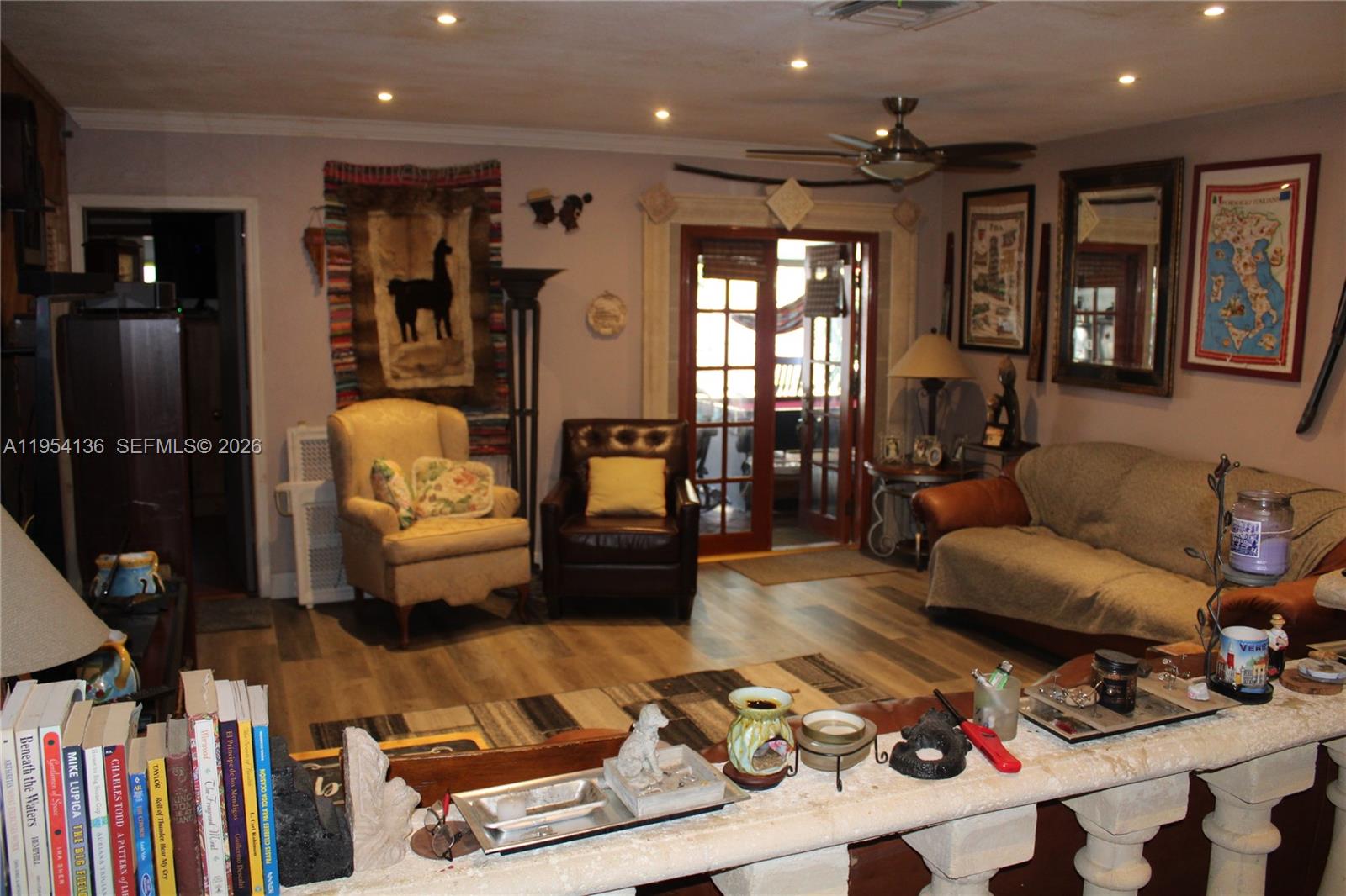 6030 Southwest 93rd Court Miami, FL 33173 - Photo 8 of 9 a living room with furniture and wooden floor