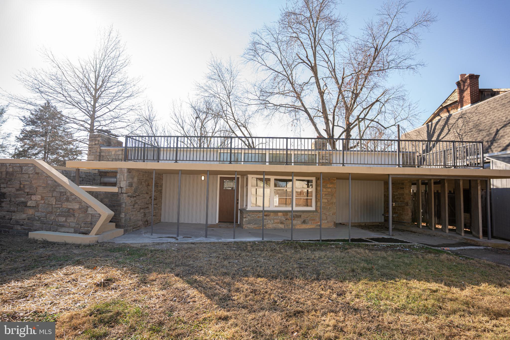 102 East Washington Street, Unit B Remington, VA 22734 - Photo 1 of 21 a view of a house with a yard covered in snow