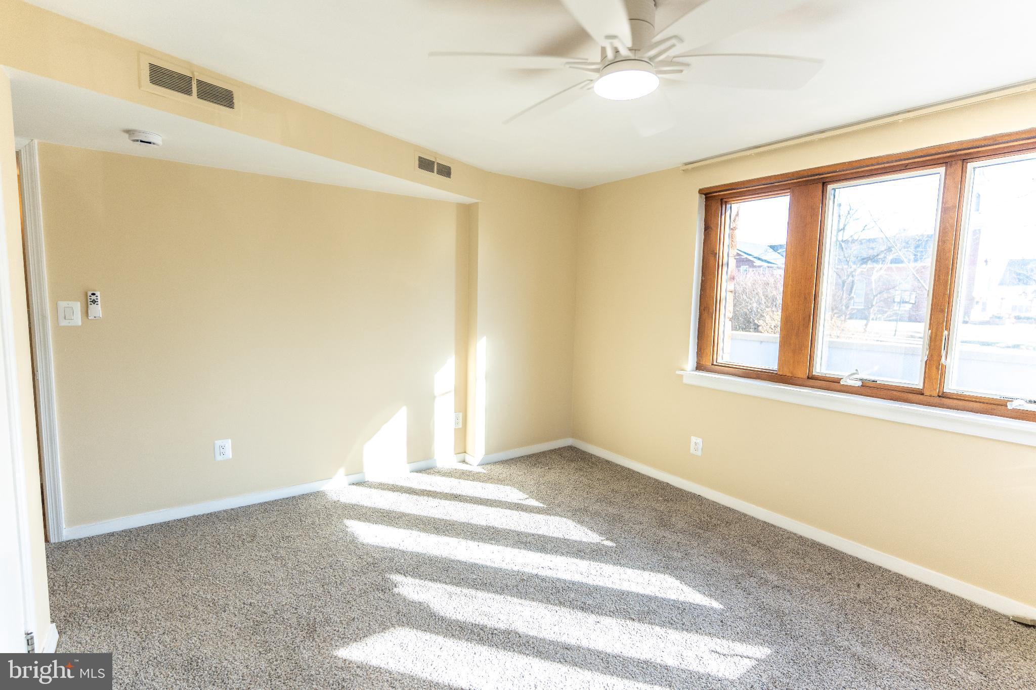 102 East Washington Street, Unit B Remington, VA 22734 - Photo 13 of 21 a view of an empty room with a window