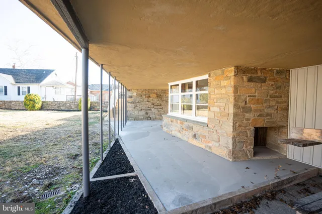 a living room with furniture oven and a table