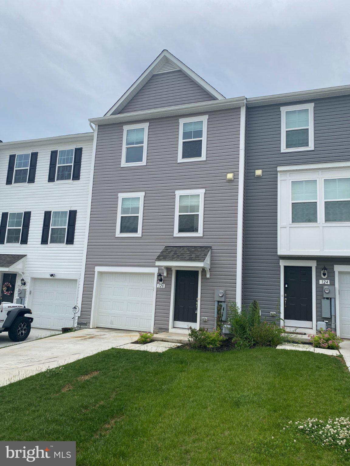 128 Tuxford Road Falling Waters, WV 25419 - Photo 2 of 27 Modern townhouse with inviting curb appeal.