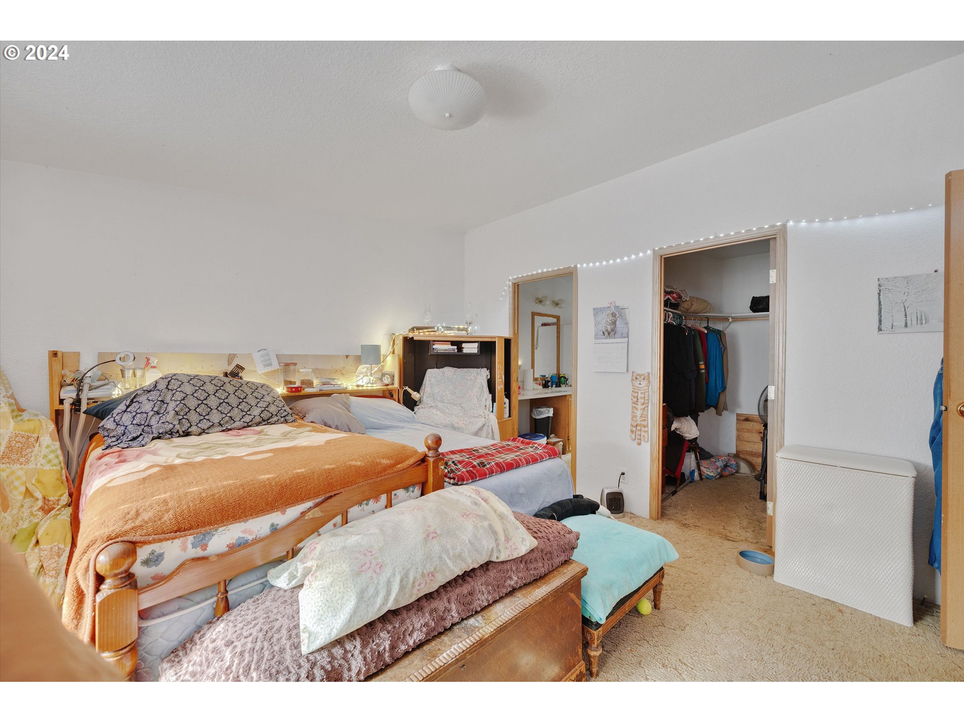 1999 Pioneer Road Dallas, OR 97338 - Photo 20 of 25 a bed room with a bed and a chair