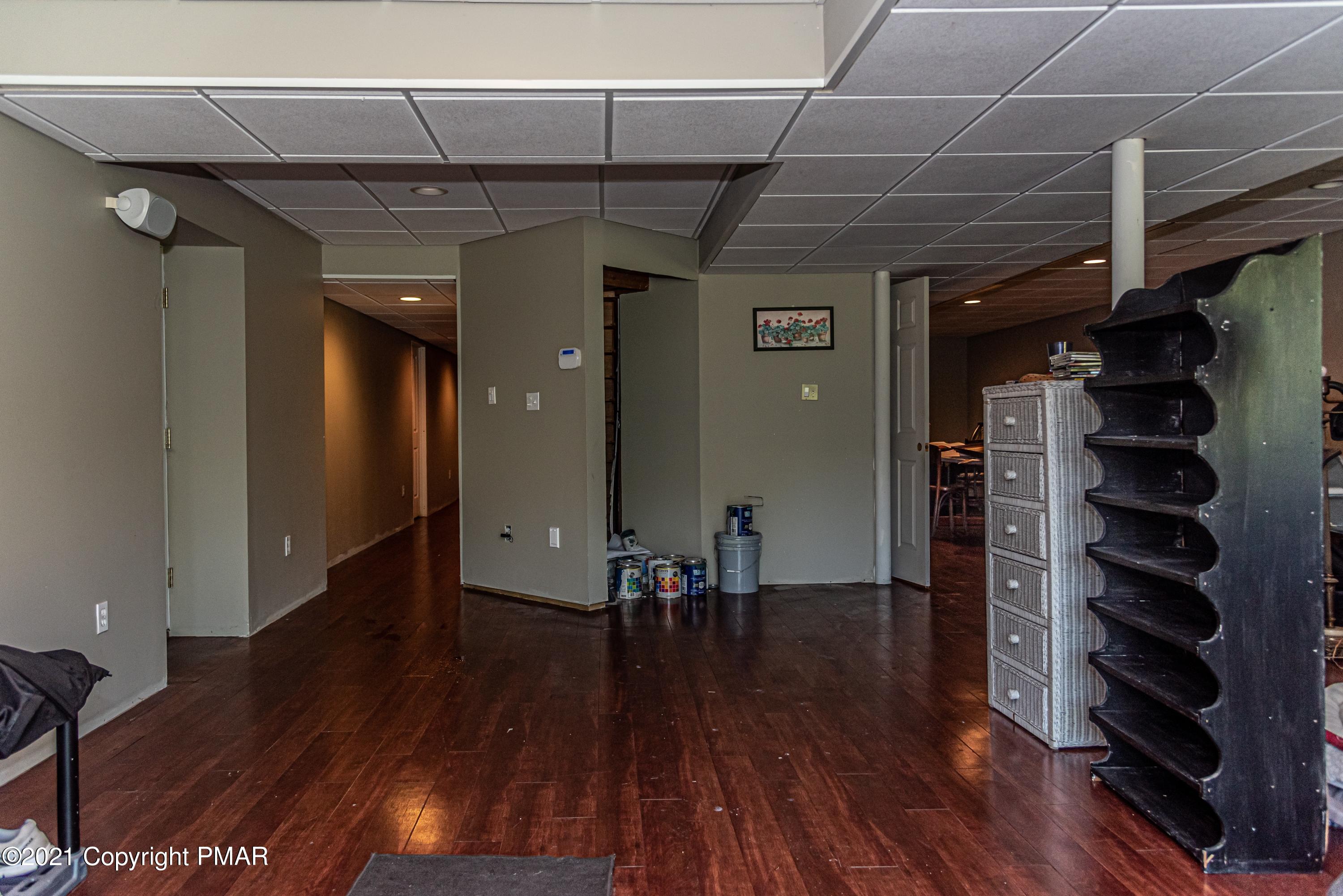 850 Red Rock Road Cresco, PA 18326 - Photo 54 of 70 wooden floor in an empty room