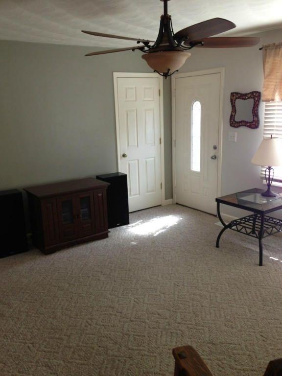 2746 Morgans Mill Road Goodview, VA 24095 - Photo 3 of 13 a living room with furniture and a window