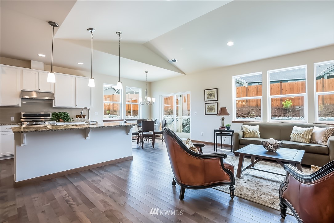 5463 Shields Road Ferndale, WA 98248 - Photo 13 of 17 a living room with furniture kitchen view and a large window