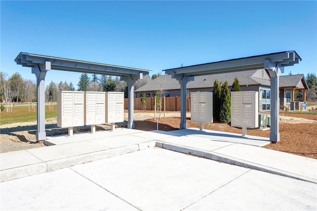 5463 Shields Road Ferndale, WA 98248 - Photo 9 of 17 a swimming pool with outdoor seating and yard