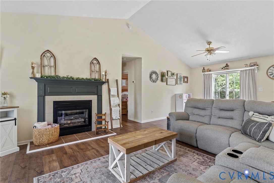 64 Edwards Court Dutton, VA 23050 - Photo 3 of 27 Spacious living area featuring a vaulted ceiling,