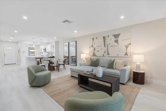 a living room with furniture and a couch