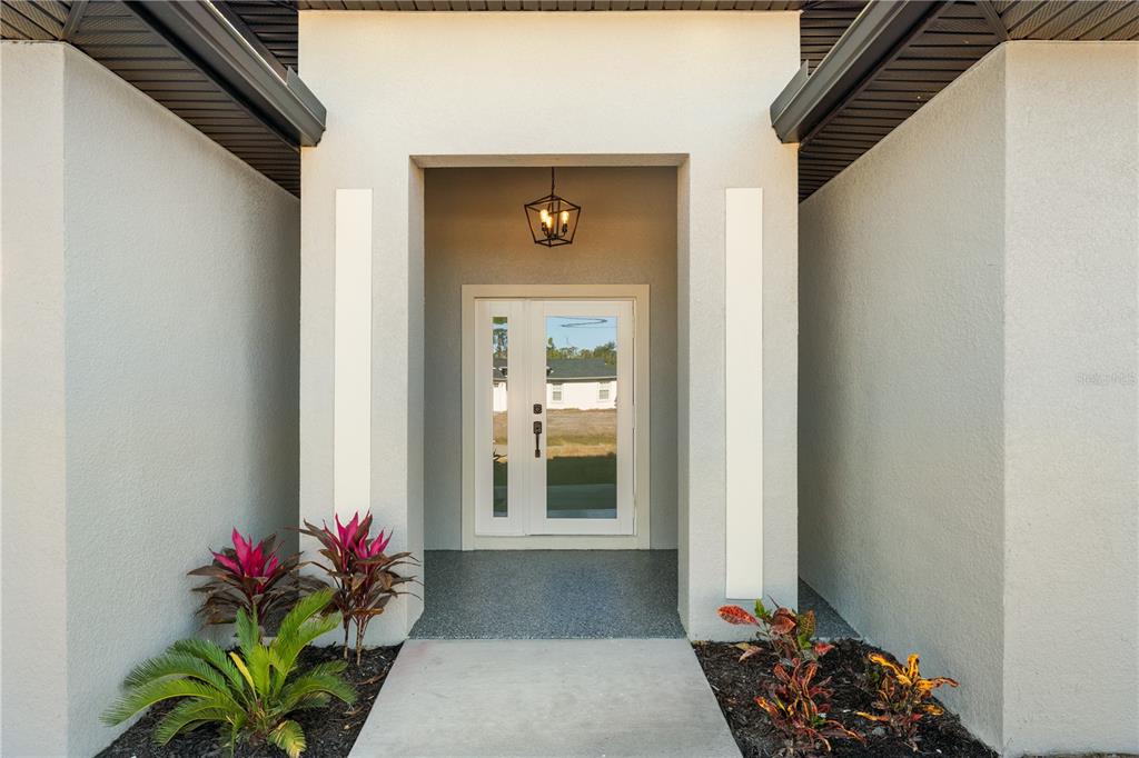 2967 Barry Road North Port, FL 34286 - Photo 2 of 19 a front view of a house