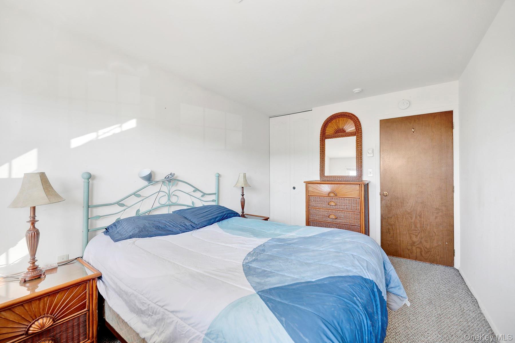 279 Berwick Court, Unit B Ridge, NY 11961 - Photo 11 of 16 Spacious, Sunny Bedroom!