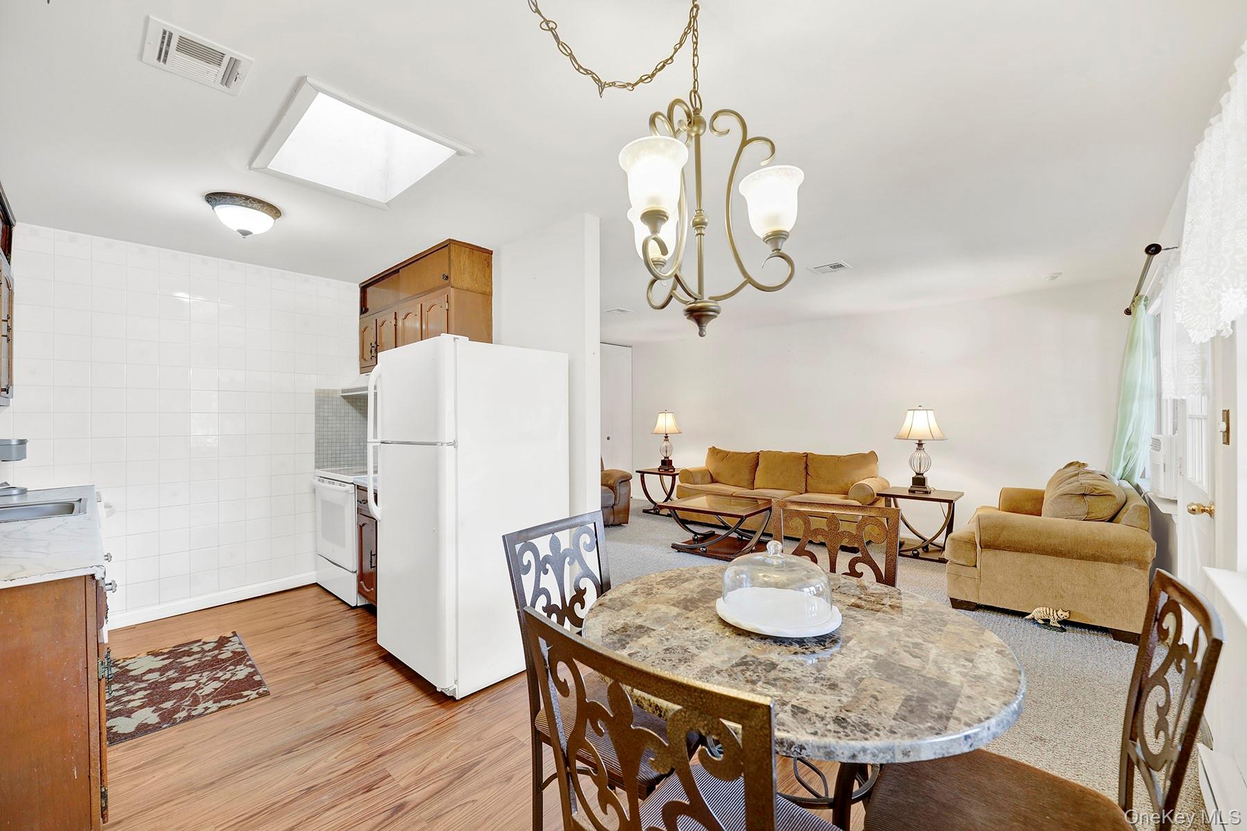 279 Berwick Court, Unit B Ridge, NY 11961 - Photo 5 of 16 Dining Area/Kitchen