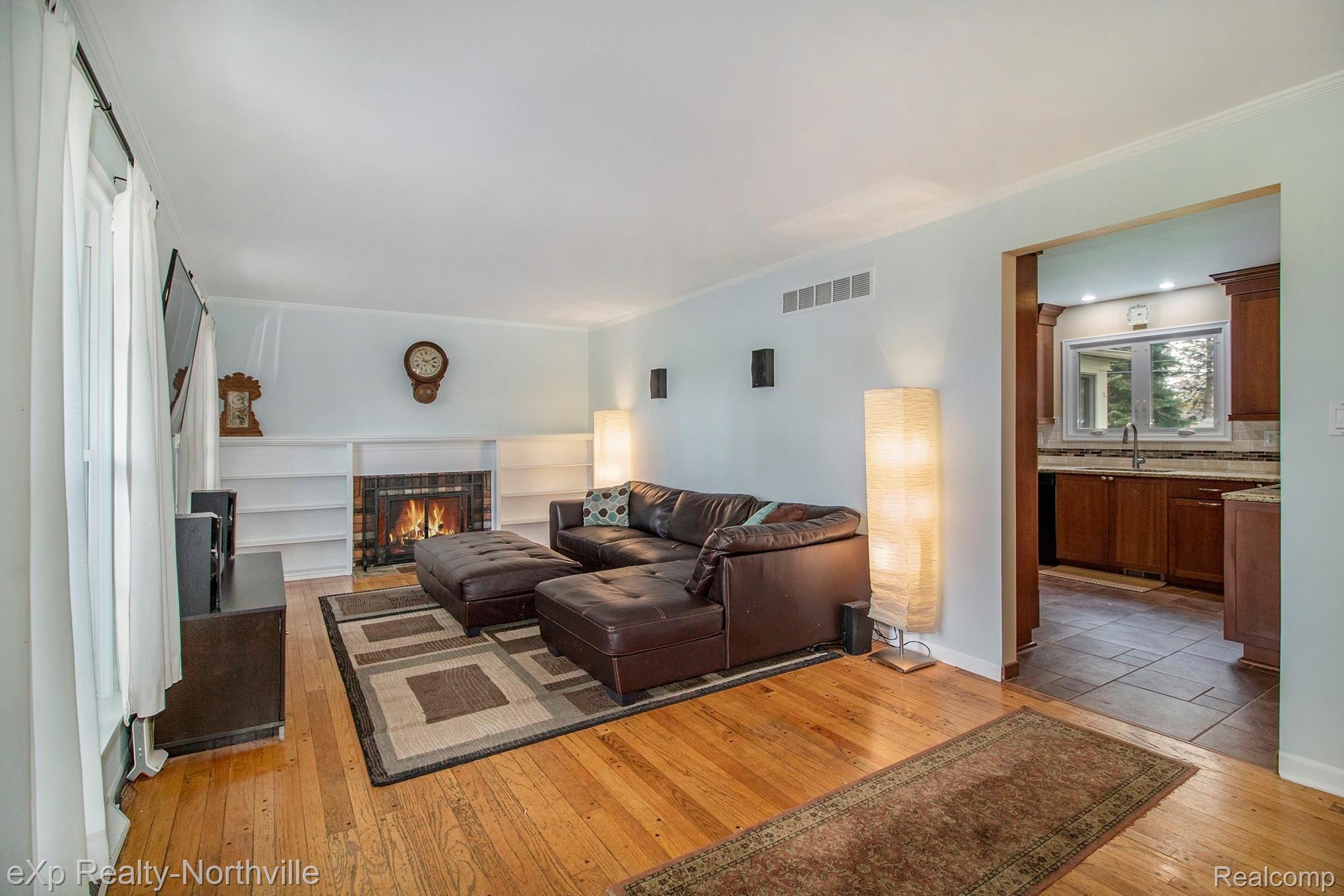 4711 Quarton Road Bloomfield Hills, MI 48301 - Photo 11 of 28 Family room with natural fireplace