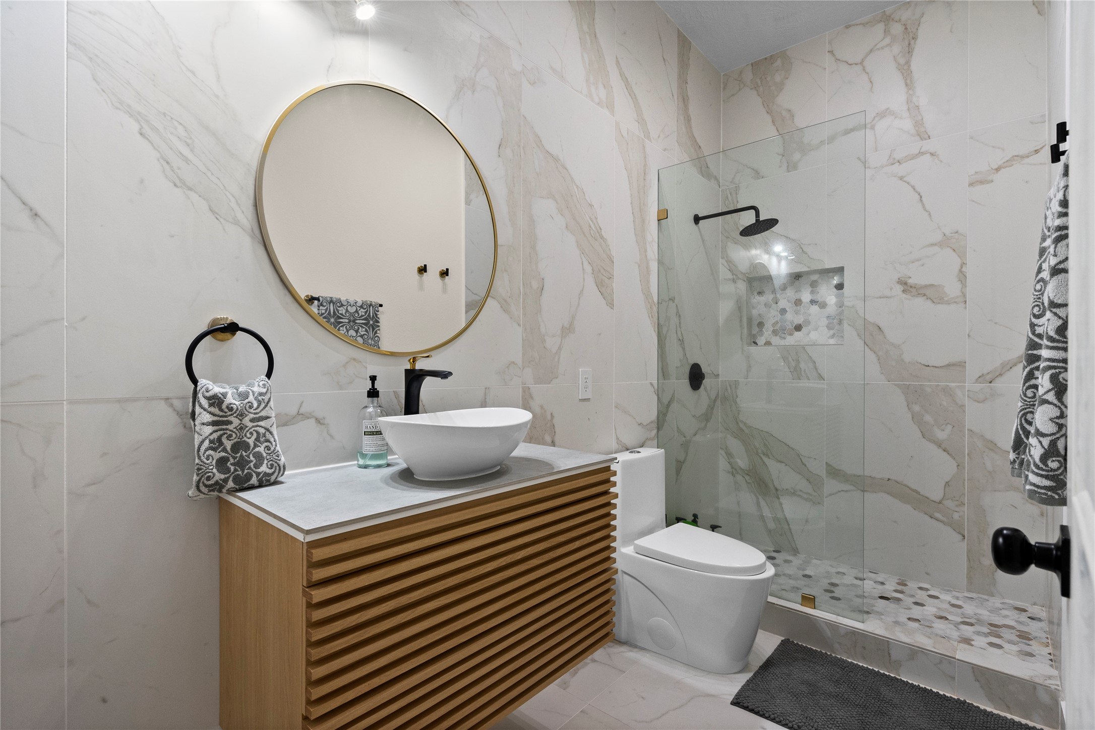 31503 Reston Cliff Court Spring, TX 77386 - Photo 20 of 28 a bathroom with a sink a toilet and shower