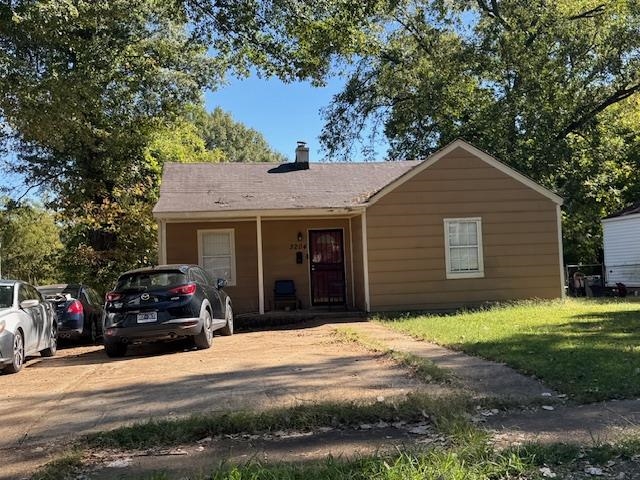 a house view with a garden space
