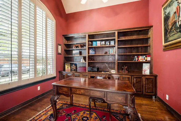 a spacious bedroom with a large bed and a large window with outer view