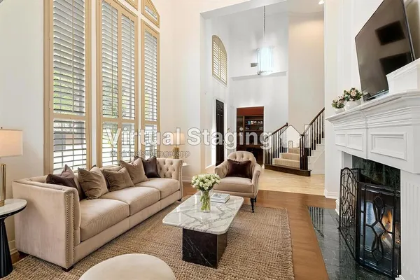 a dining room with furniture and window