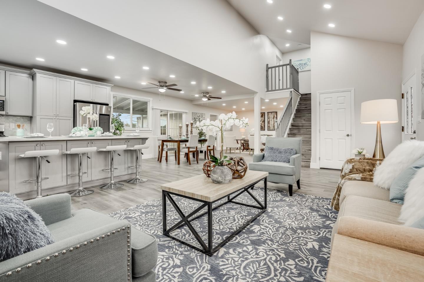 17675 Laurel Road Morgan Hill, CA 95037 - Photo 11 of 48 a living room with lots of furniture and kitchen view