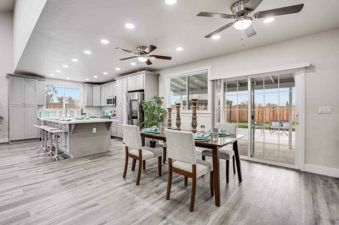 17675 Laurel Road Morgan Hill, CA 95037 - Photo 15 of 48 a view of a dining room with furniture window and wooden floor