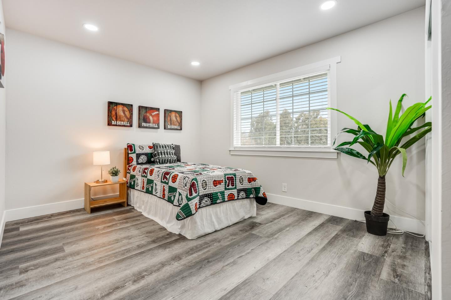 17675 Laurel Road Morgan Hill, CA 95037 - Photo 34 of 48 a bedroom with a bed and a potted plant