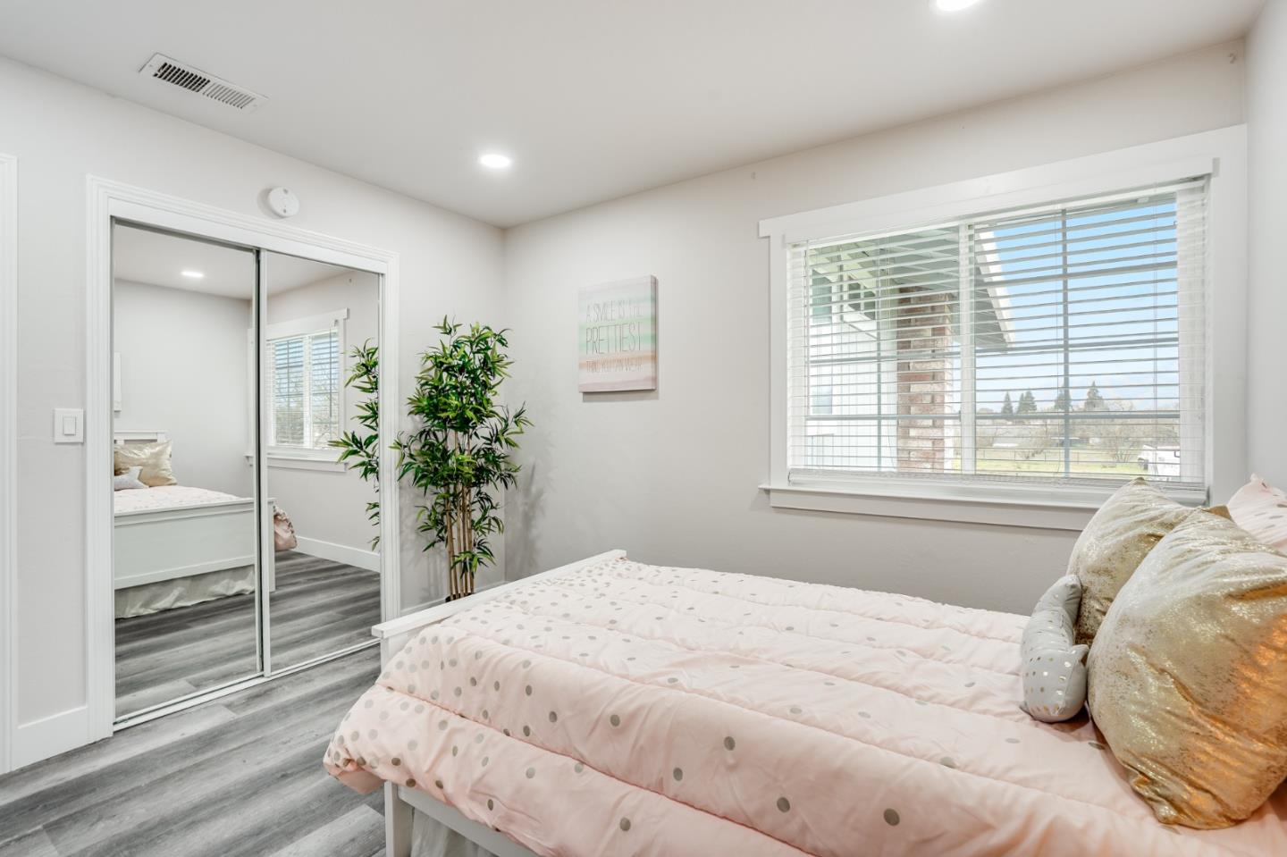 17675 Laurel Road Morgan Hill, CA 95037 - Photo 37 of 48 a bedroom with a bed and a large window