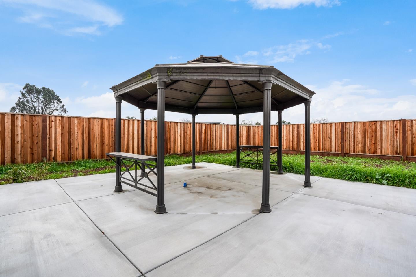17675 Laurel Road Morgan Hill, CA 95037 - Photo 40 of 48 a view of a table and chairs under an umbrella