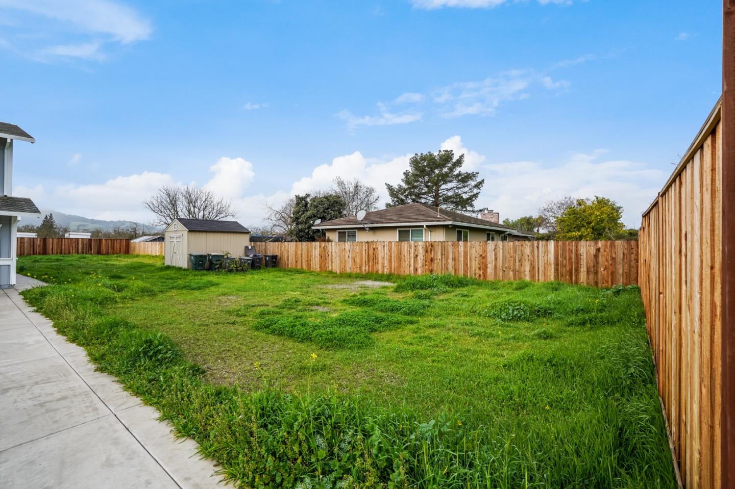 17675 Laurel Road Morgan Hill, CA 95037 - Photo 4 of 48 a view of a house with backyard and garden