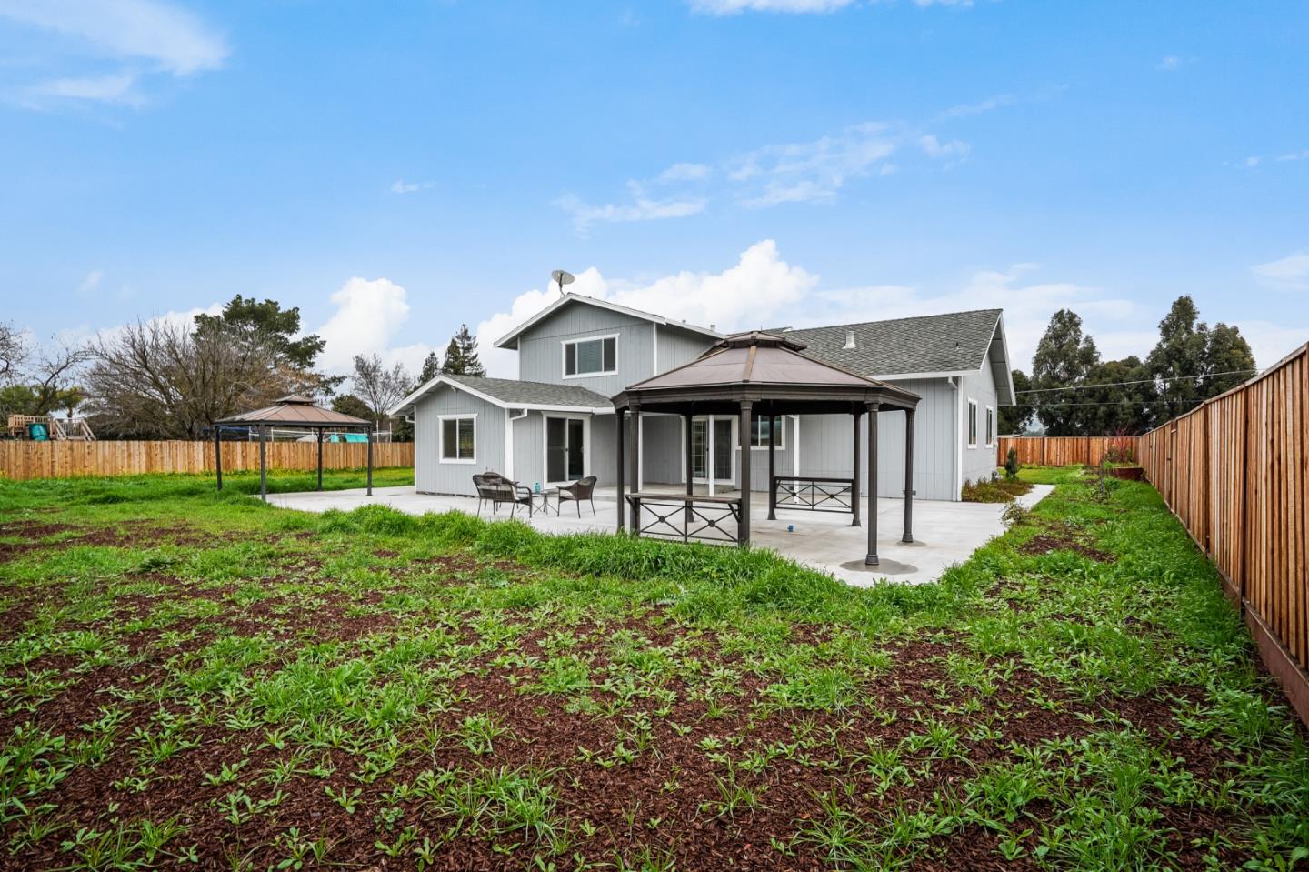 17675 Laurel Road Morgan Hill, CA 95037 - Photo 45 of 48 a view of a house with a yard and plants
