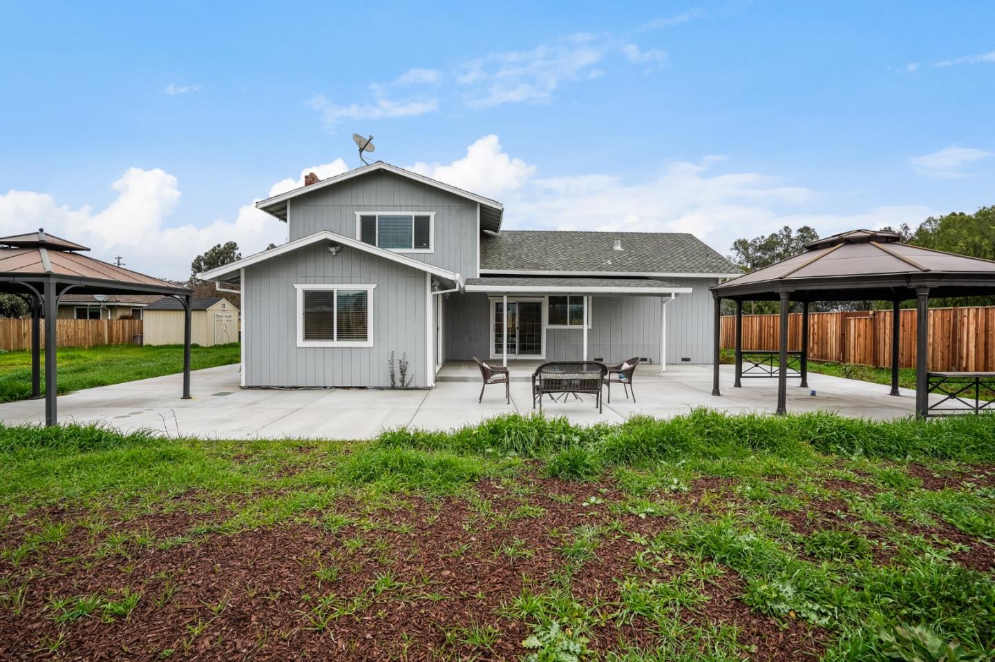 17675 Laurel Road Morgan Hill, CA 95037 - Photo 46 of 48 a front view of a house with a yard and porch