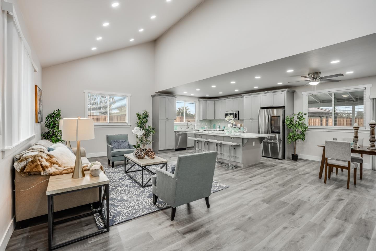 17675 Laurel Road Morgan Hill, CA 95037 - Photo 9 of 48 a living room with lots of furniture and kitchen view