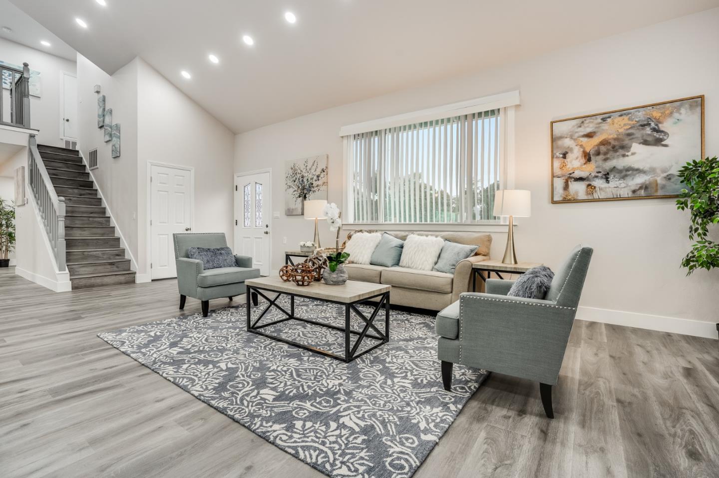 17675 Laurel Road Morgan Hill, CA 95037 - Photo 10 of 48 a living room with furniture and a wooden floor