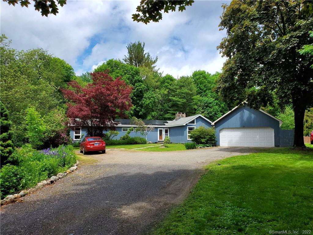 135 Allerton Road Naugatuck, CT 06770 - Photo 1 of 1 a view of a house with a yard and sitting area