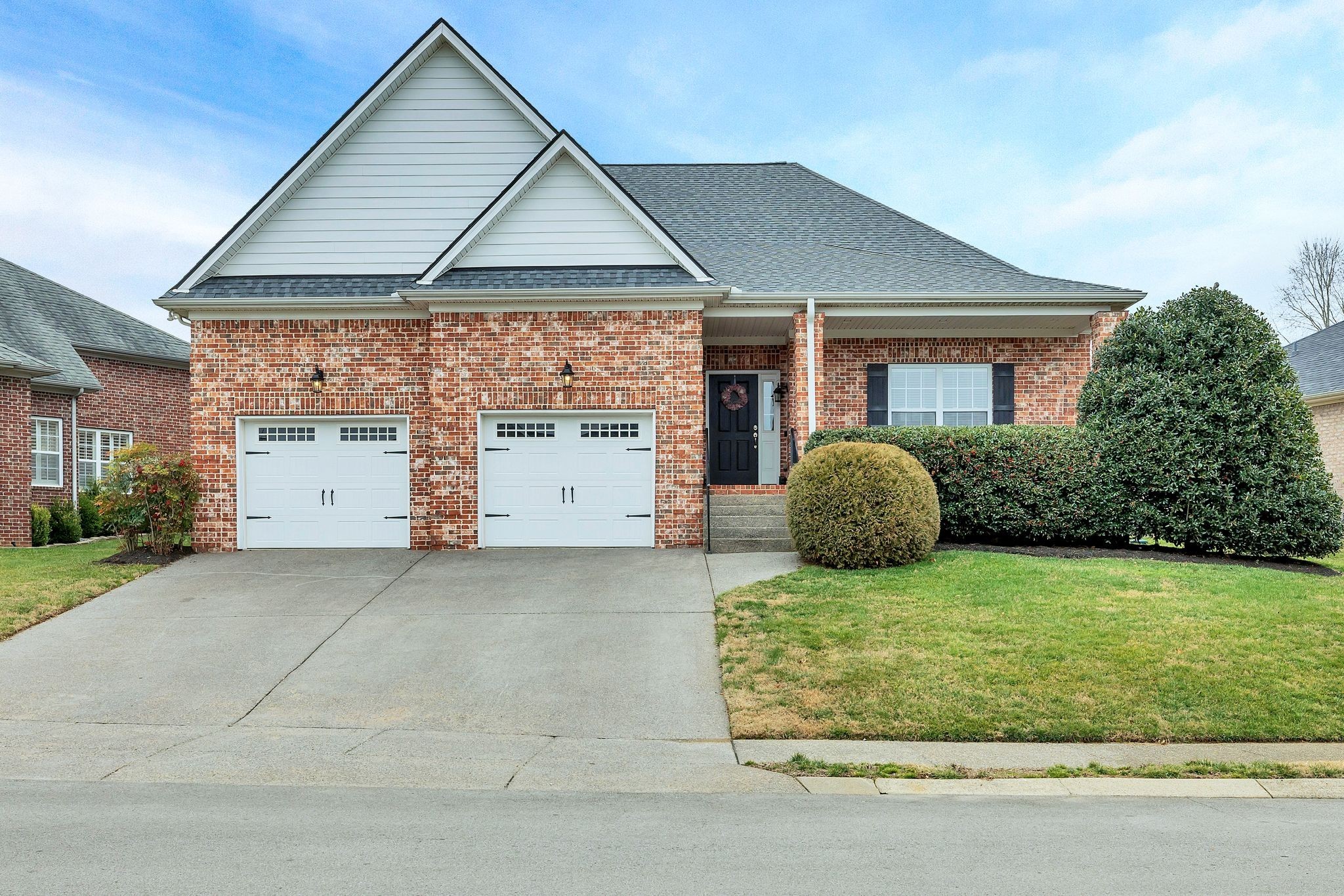 2009 Sunflower Drive Spring Hill, TN 37174 - Photo 1 of 34 a view of a house with a yard and garage