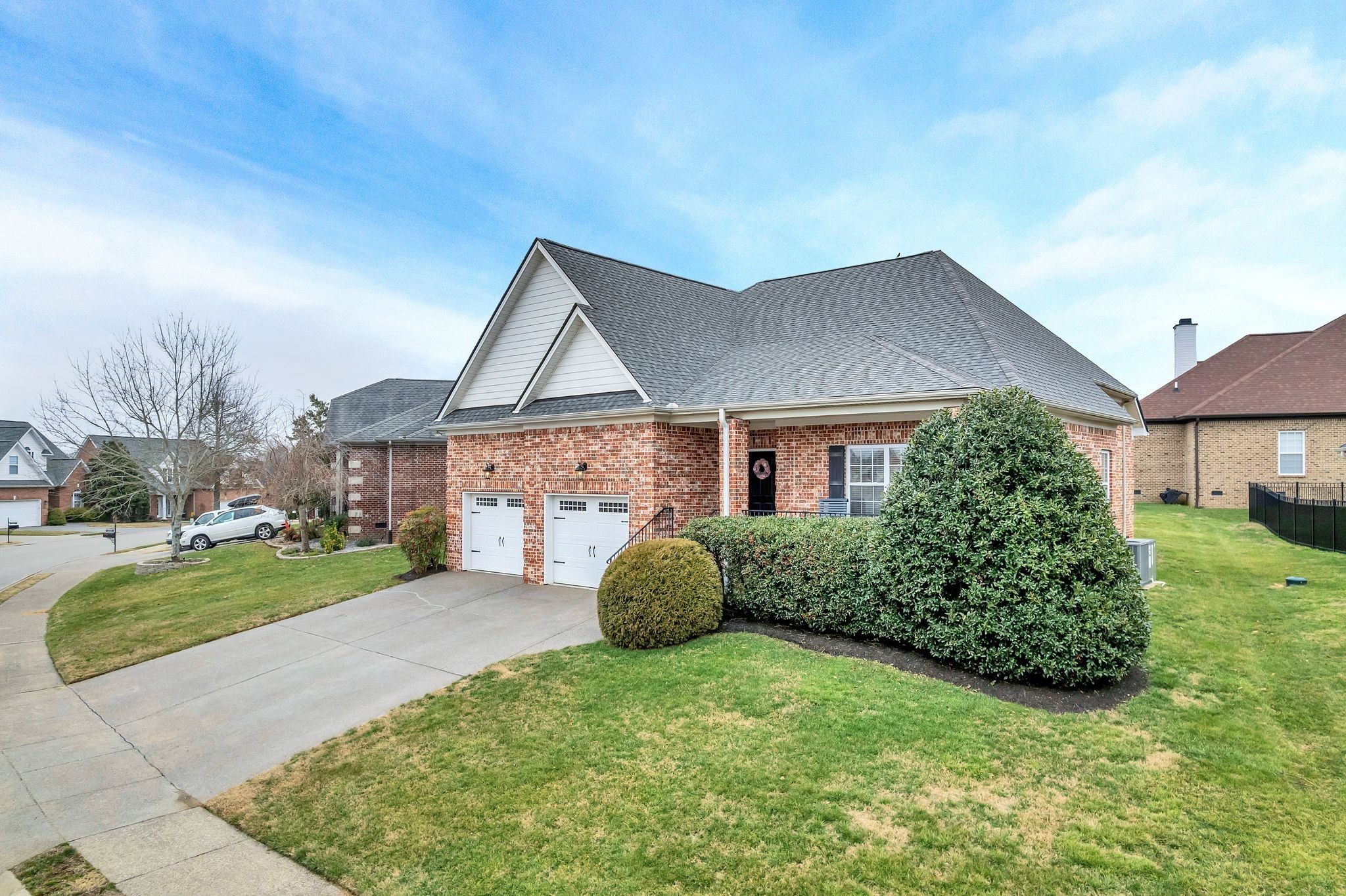 2009 Sunflower Drive Spring Hill, TN 37174 - Photo 2 of 34 a front view of a house with a yard and garage